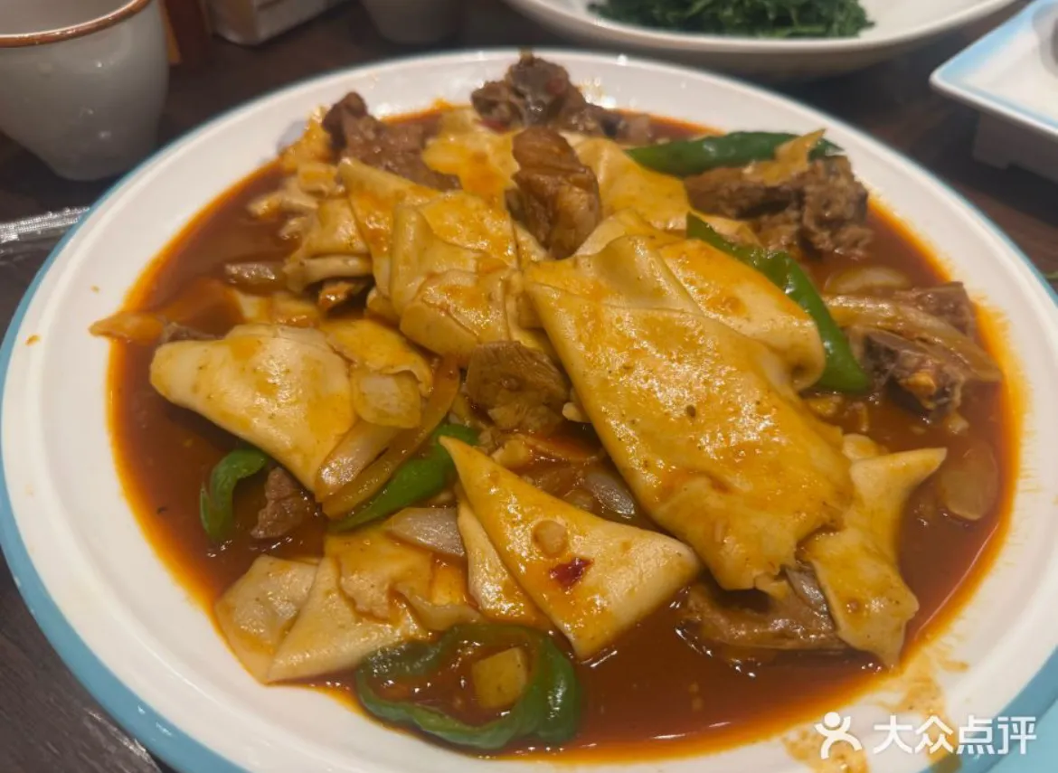 胡杨焖饼 图源 Yummy@大众点评